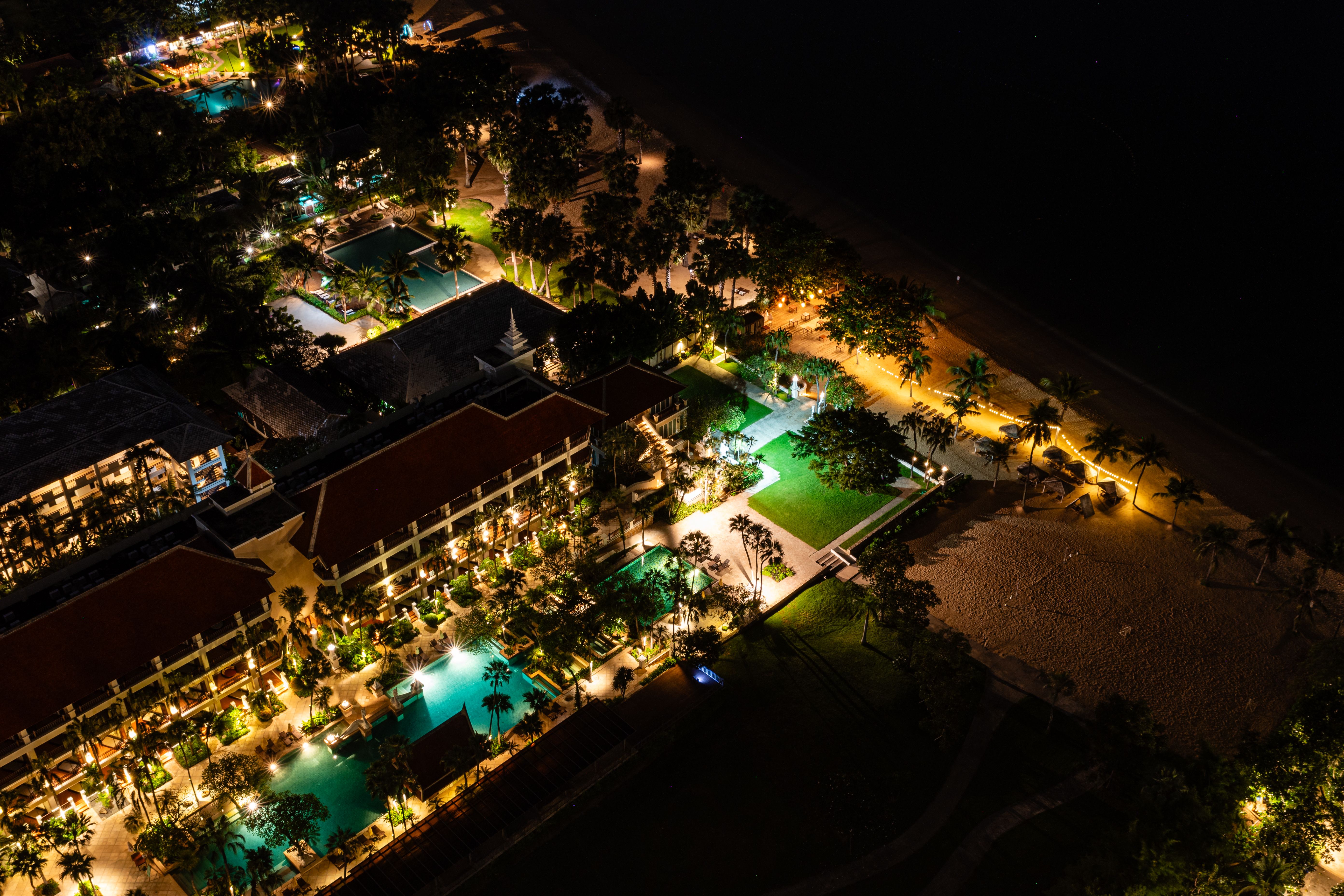 Festive lights and Christmas decorations at a Bali beach resort during the December peak season