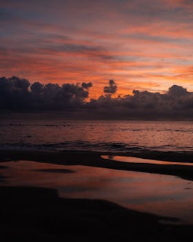 Beautiful sunset with stunning reflections on Coogee Beach, Australia.