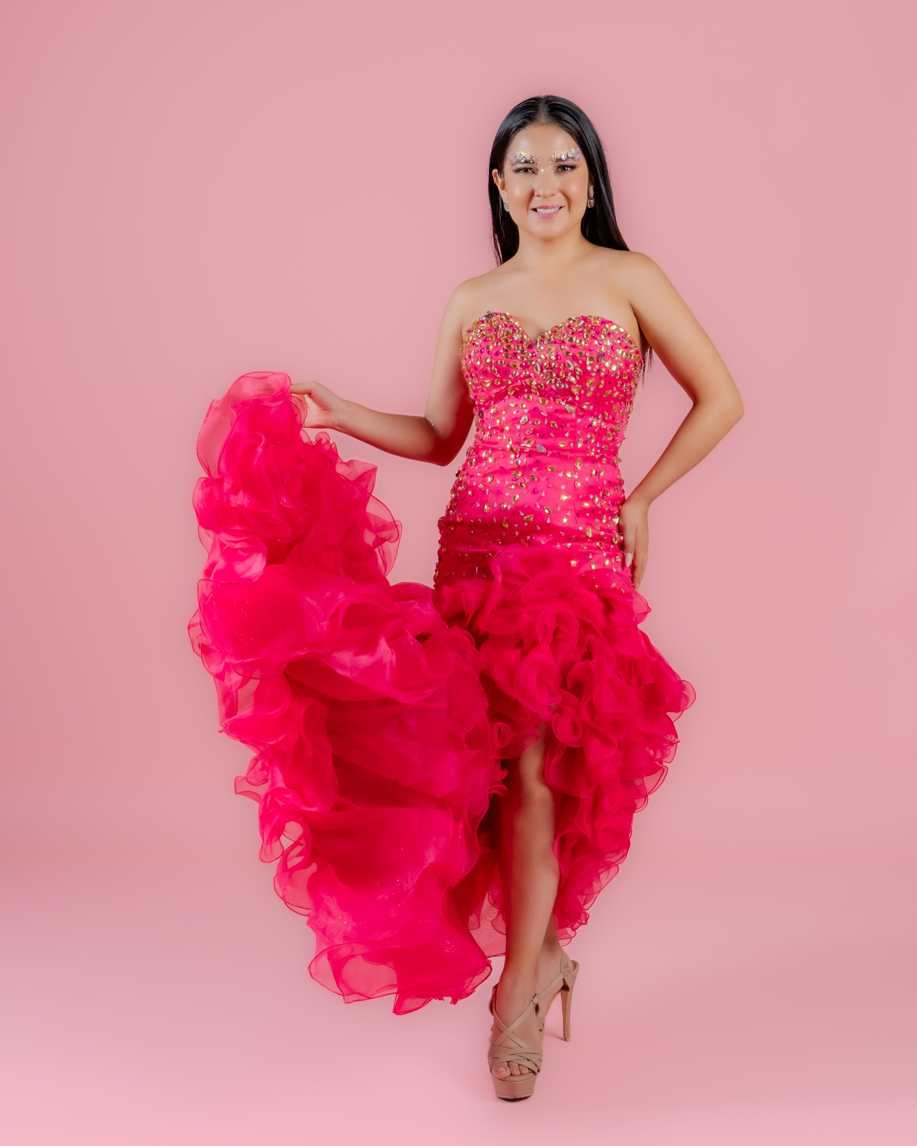 Elegant Woman in a Vibrant Pink Dress