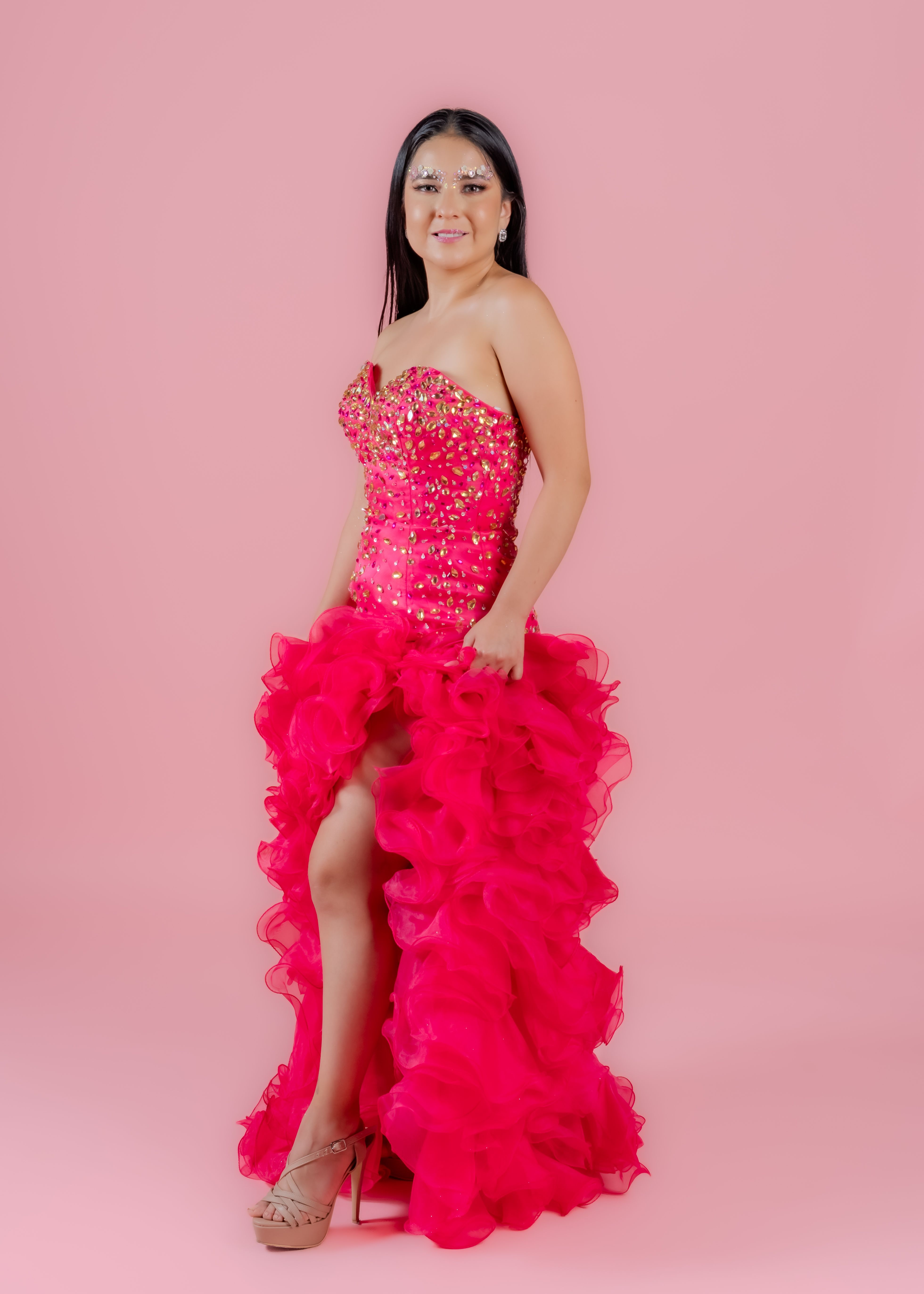 Elegant Woman in Vibrant Pink Gown