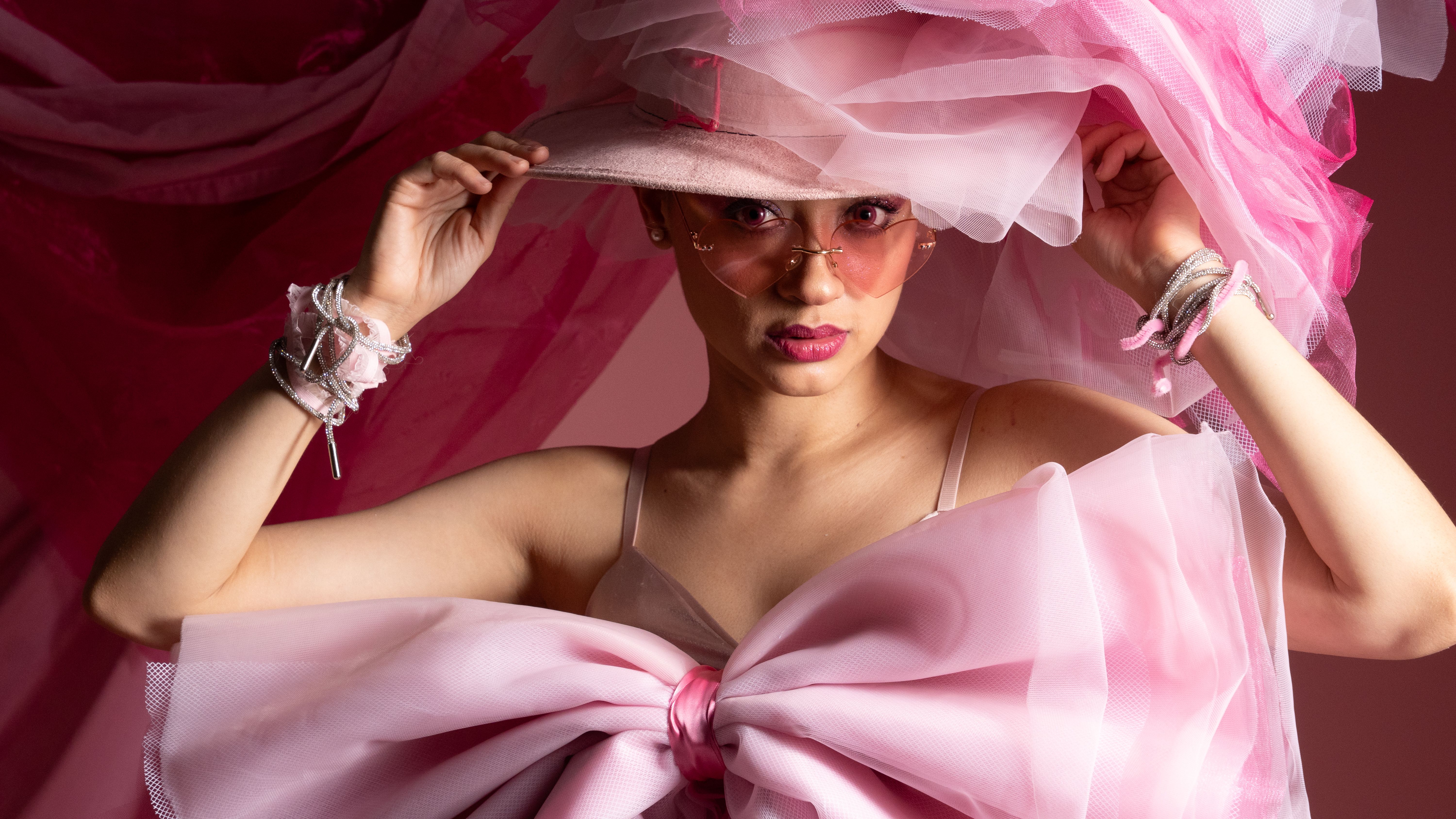 Elegant Female Portrait in Pink Themed Fashion