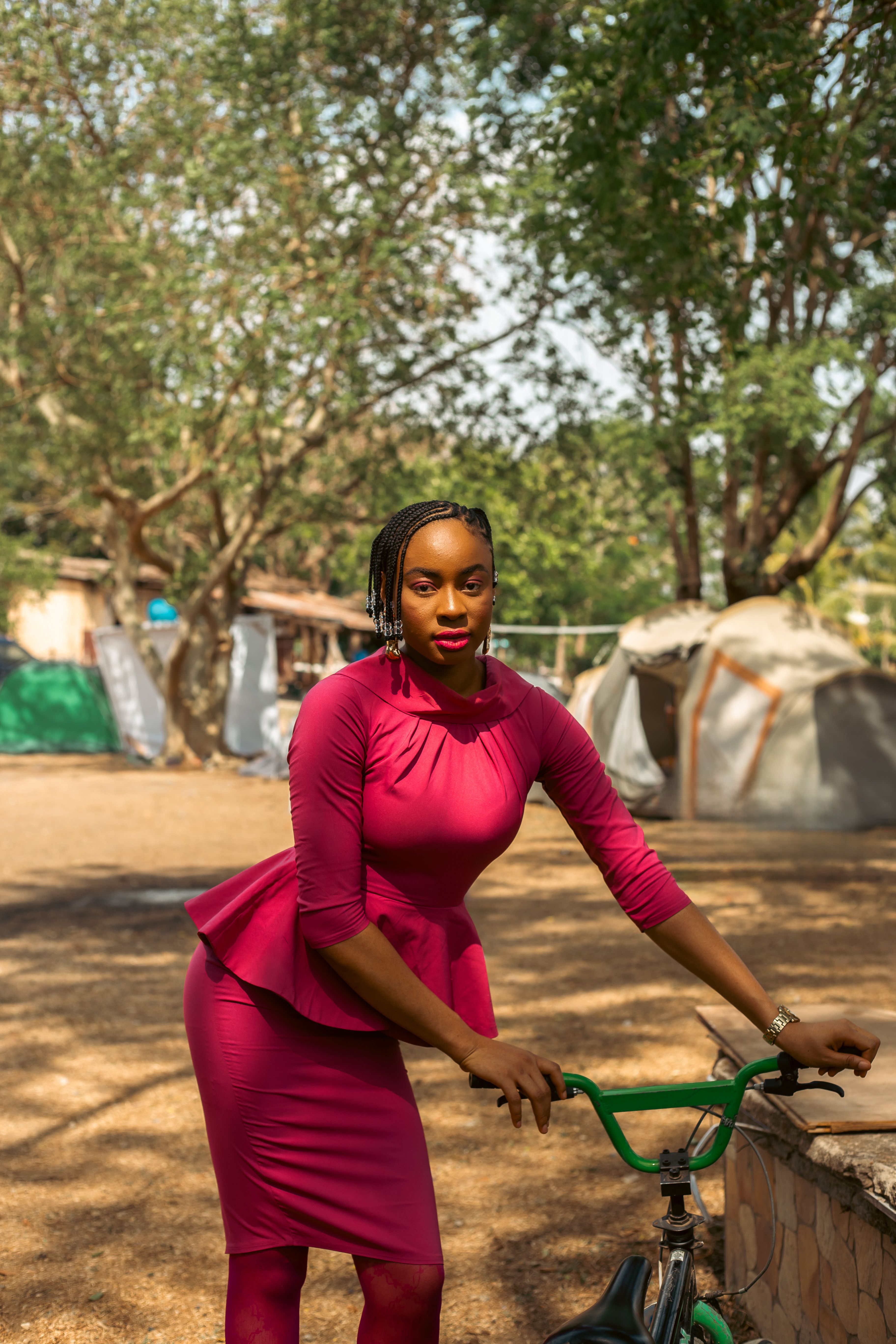 Elegant Woman in Pink Dress with Bicycle Outdoors · Free Stock Photo