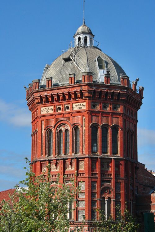 Free A close-up of the iconic red brick tower of Fener Greek Orthodox College in Istanbul, showcasing its architectural beauty. Stock Photo