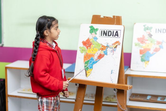 Cadet studying a map in class