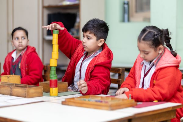 Young students engaged in a classroom learning activity