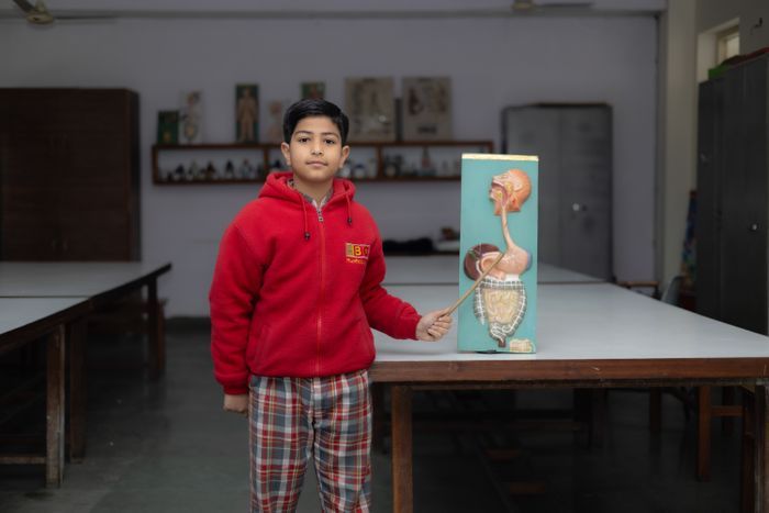 Indian school student studying human anatomy