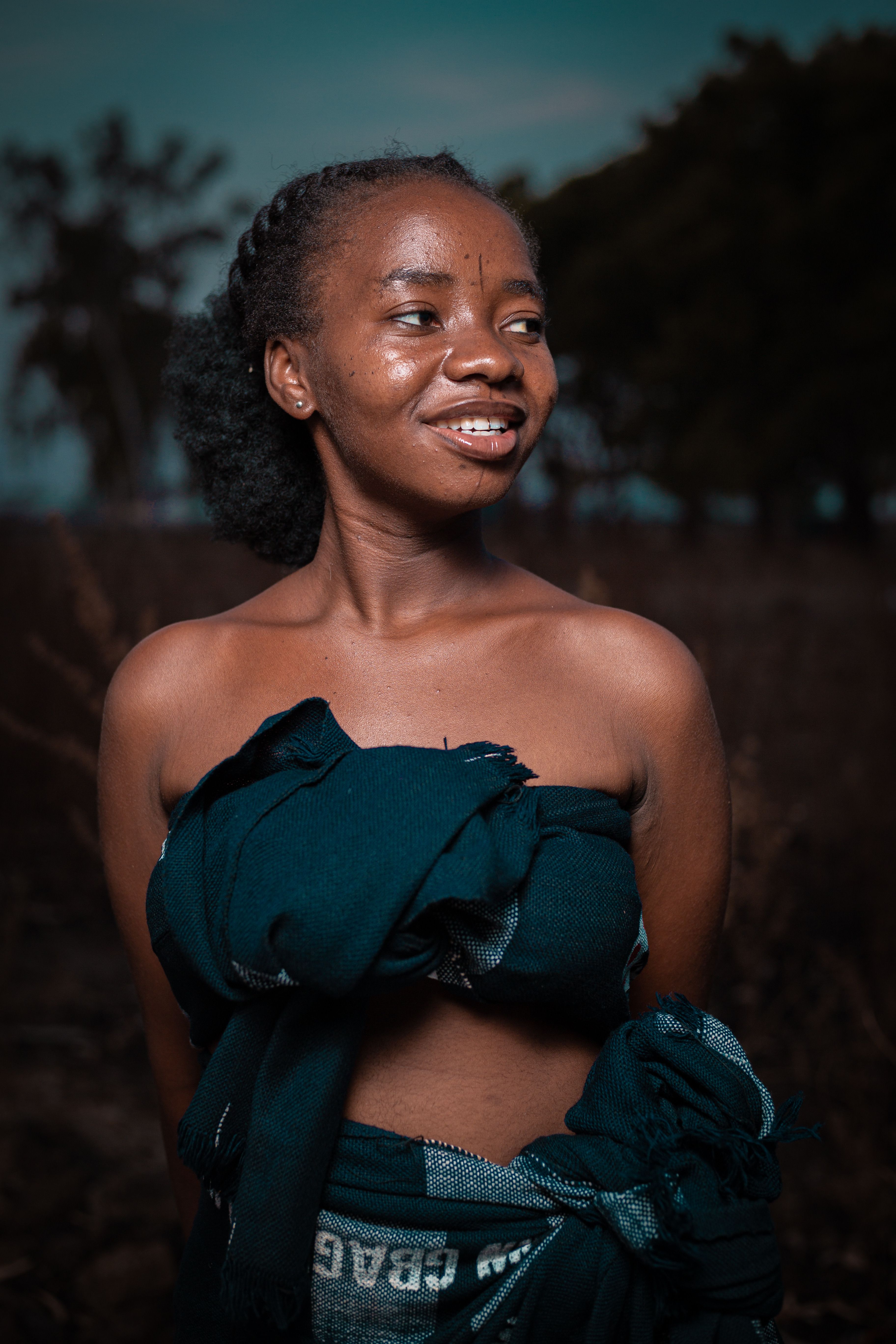 Portrait of Smiling Young Woman Outdoors · Free Stock Photo
