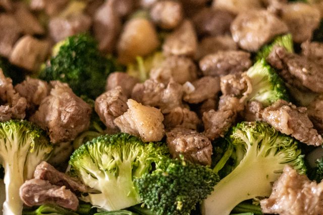 Delicious beef and broccoli stir fry with vibrant colors and appetizing texture.