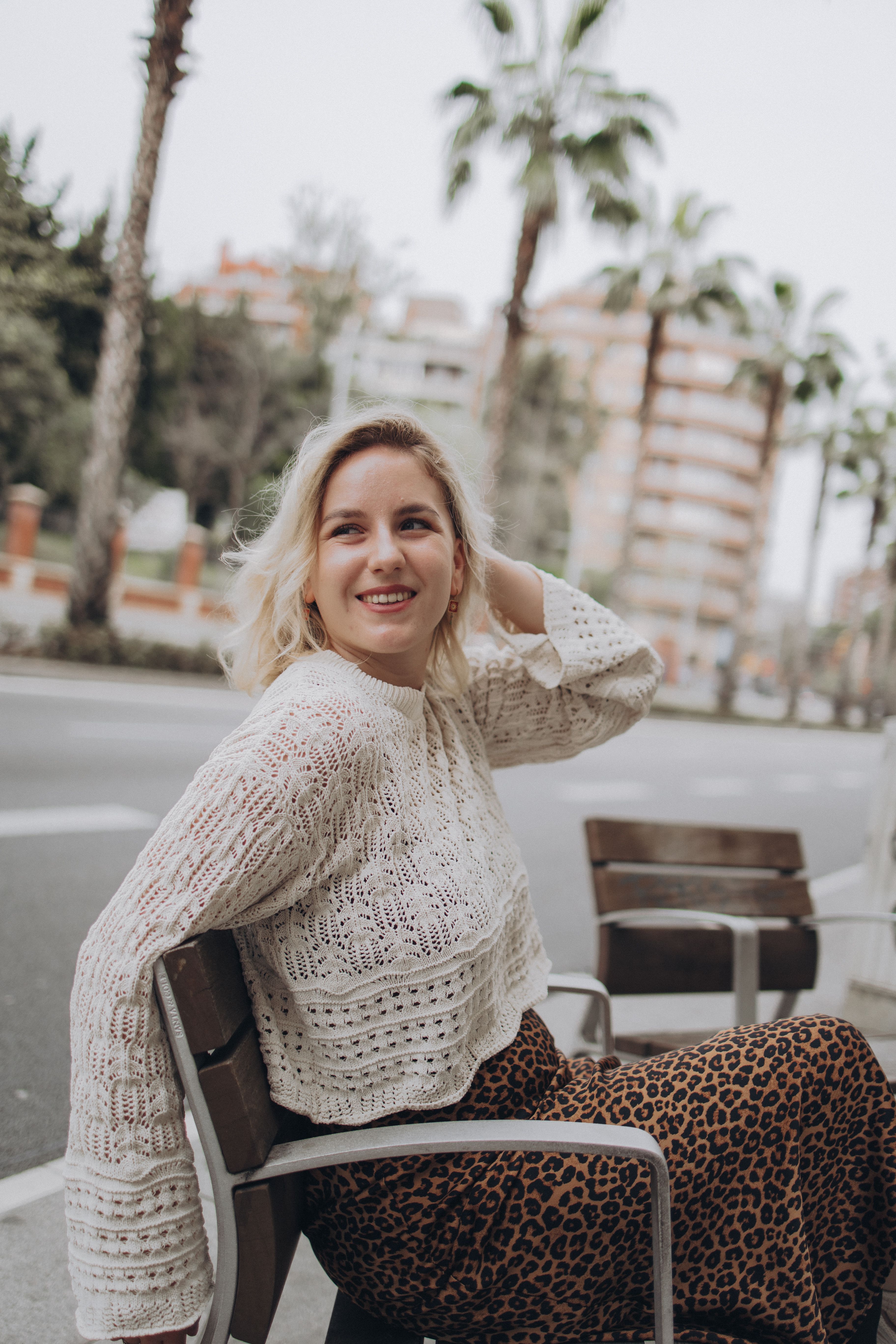 Outdoor Casual Portrait of Smiling Woman with Palm Trees · Free Stock Photo