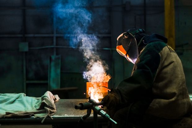 Trainee in workshop safety gear