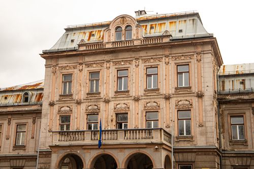 Free Explore the historic charm of classic Balkan architecture in Bosnia with this vintage building facade. Stock Photo