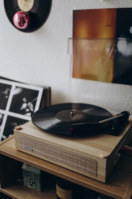 Cozy room featuring a vintage record player and vinyl albums, creating a nostalgic music atmosphere.