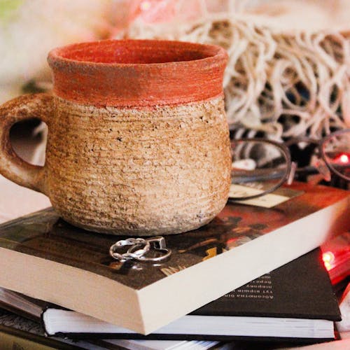 Clay Mug on Book