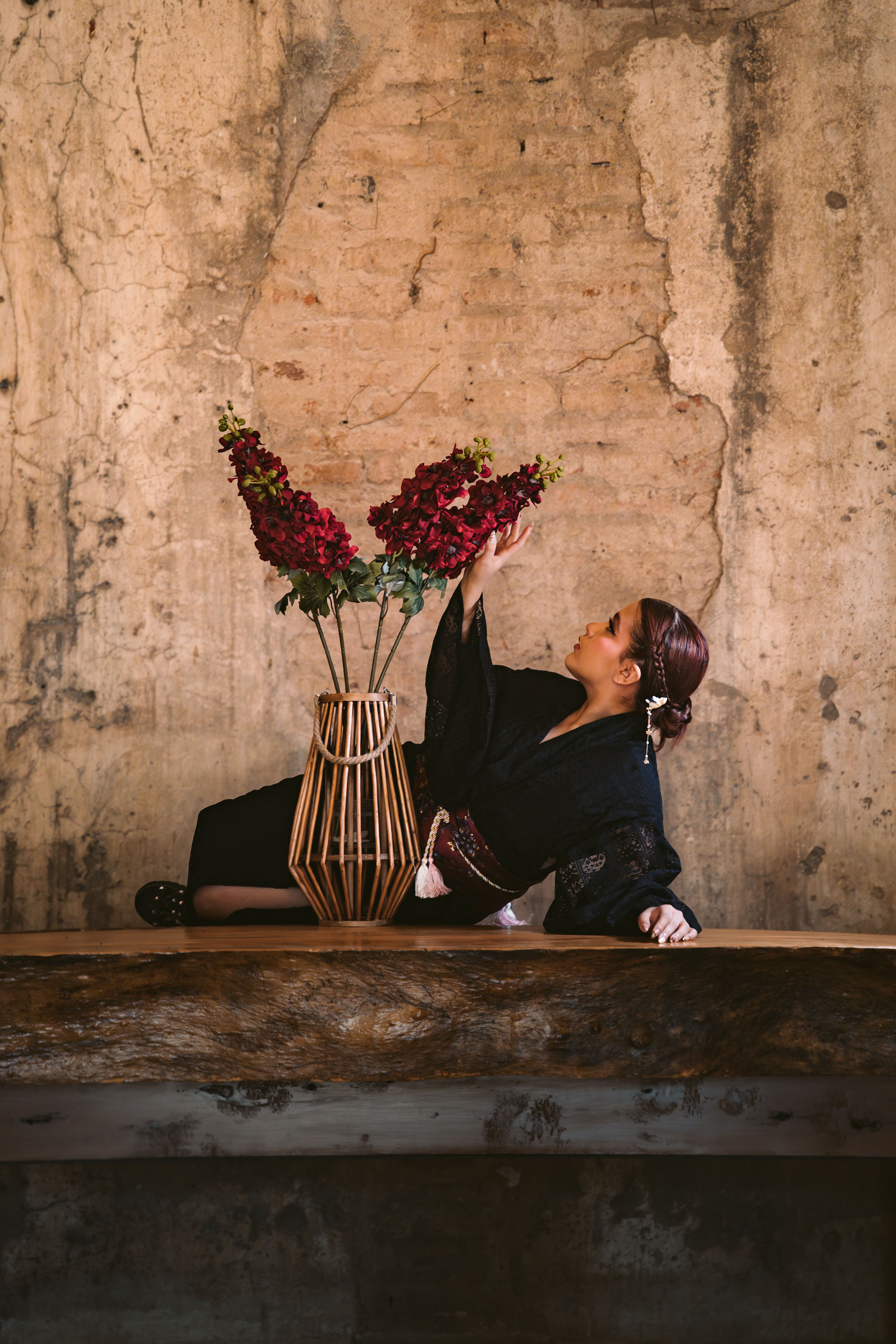 Elegant Portrait of Woman with Red Flowers · Free Stock Photo