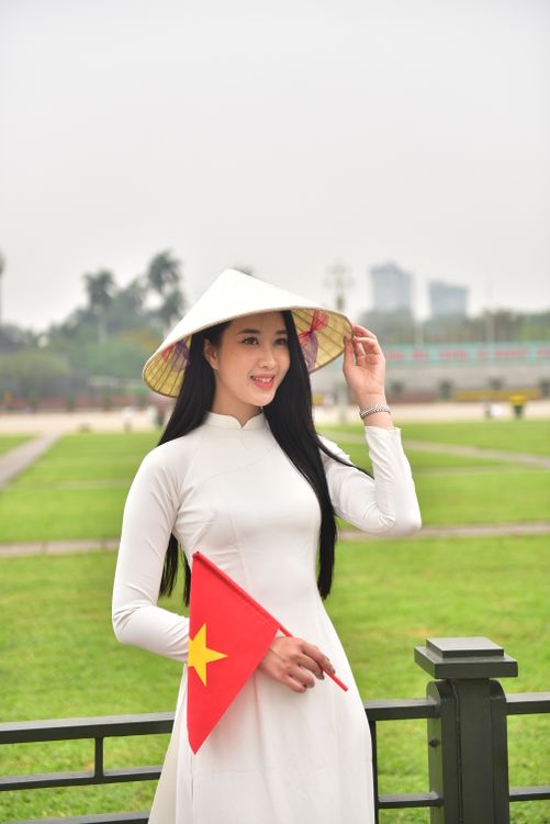 Young Woman in Traditional Vietnamese Dress Outdoors Free Stock Photo Young Woman in Traditional Vietnamese Dress Outdoors Free Stock Photo