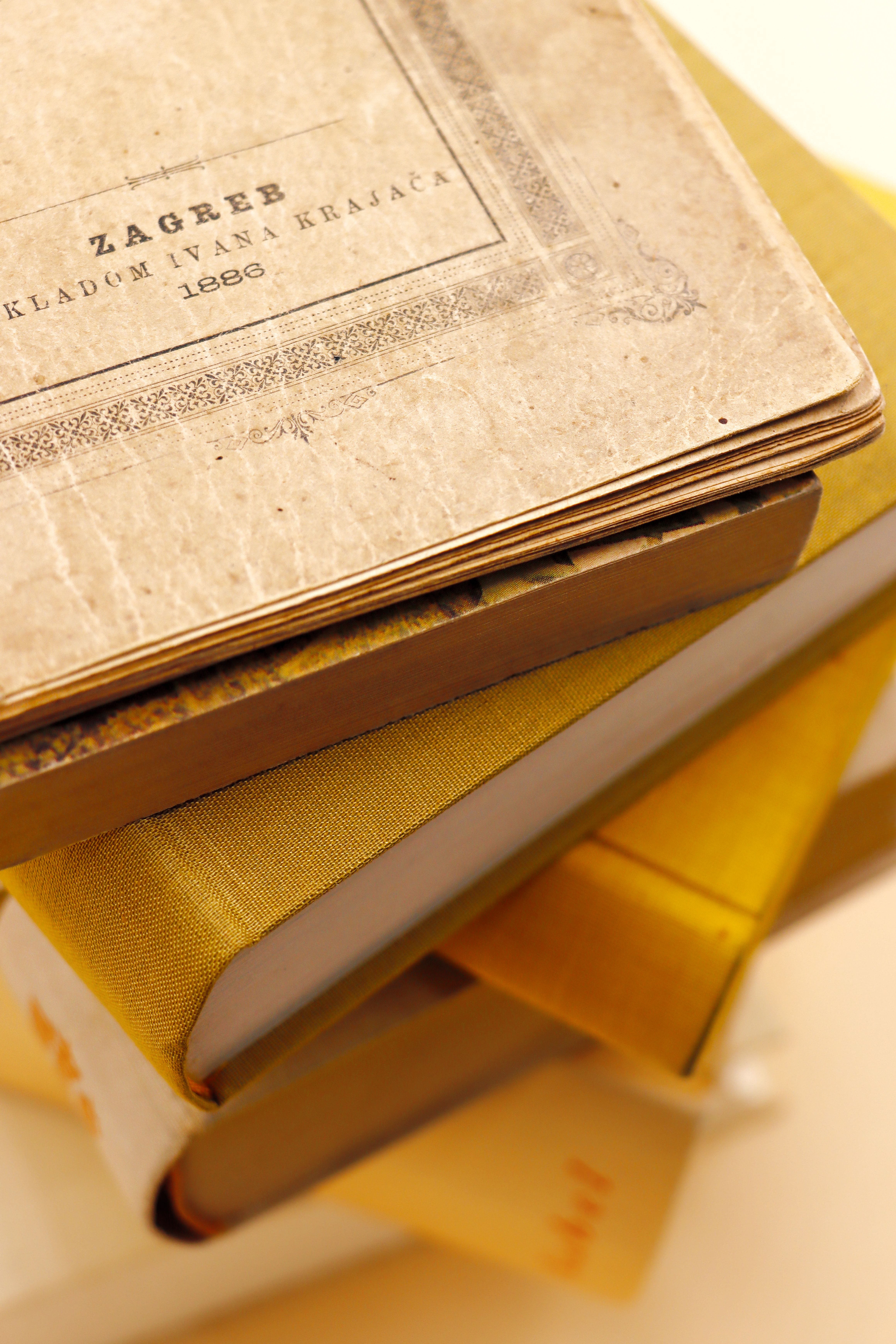 First edition literary novel on a stack of books