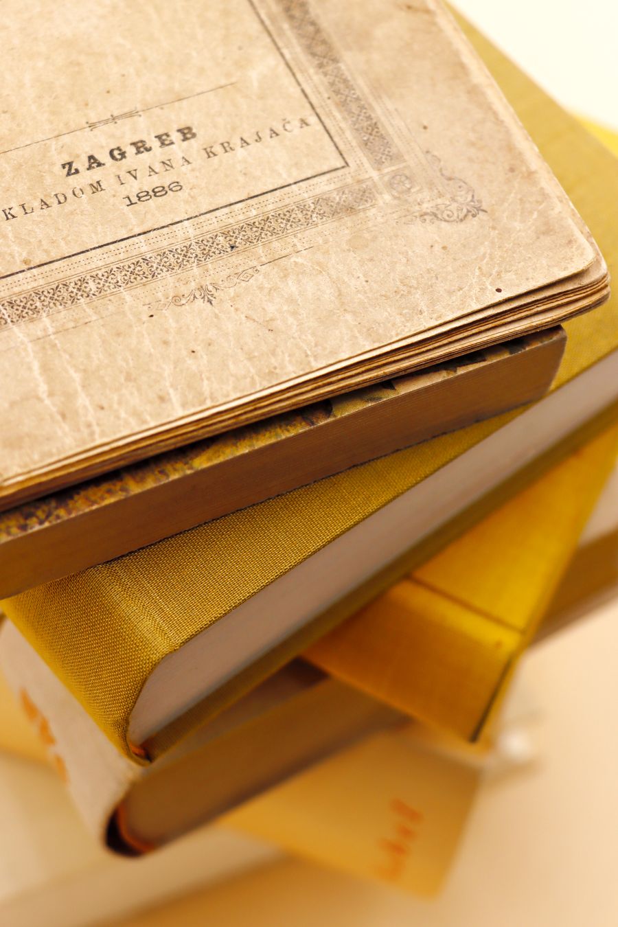 Stack of antique books with vintage covers