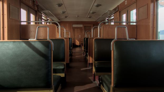 Explore the classic wooden interior of a vintage train in Munich, capturing a nostalgic ambiance.