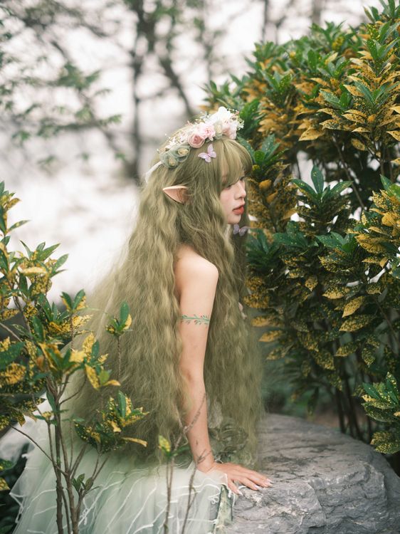 Enchanted Forest Elf with Long Hair and Floral Crown · Free Stock Photo