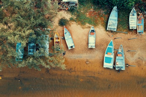 Free Aerial Photography of Wooden Boats on Shore Stock Photo