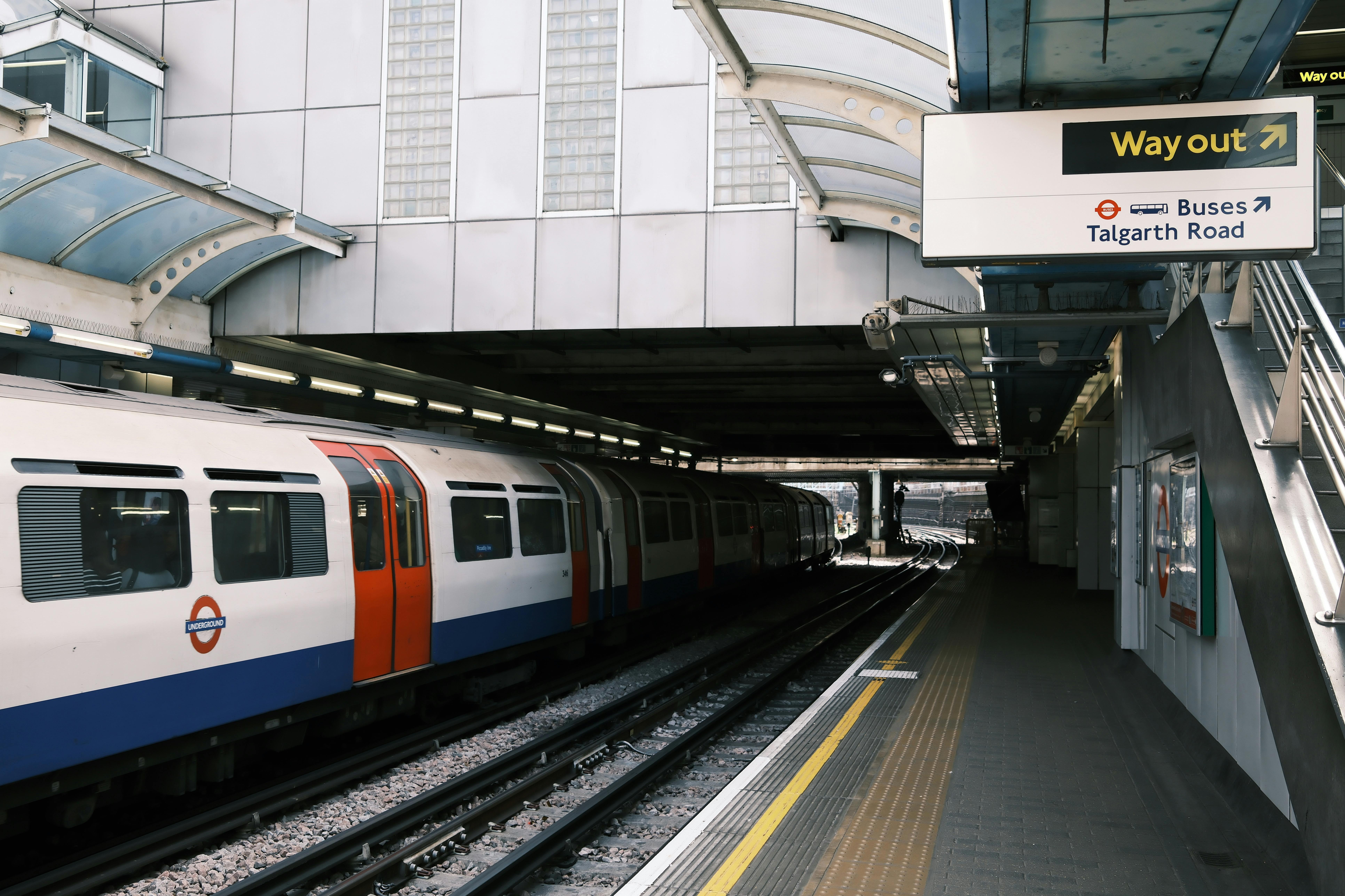 London Underground train captured at Hammersmith station during the day.