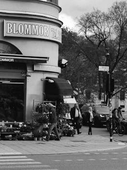 Monochrome street photo of a flower shop corner in Stockholm, Sweden.