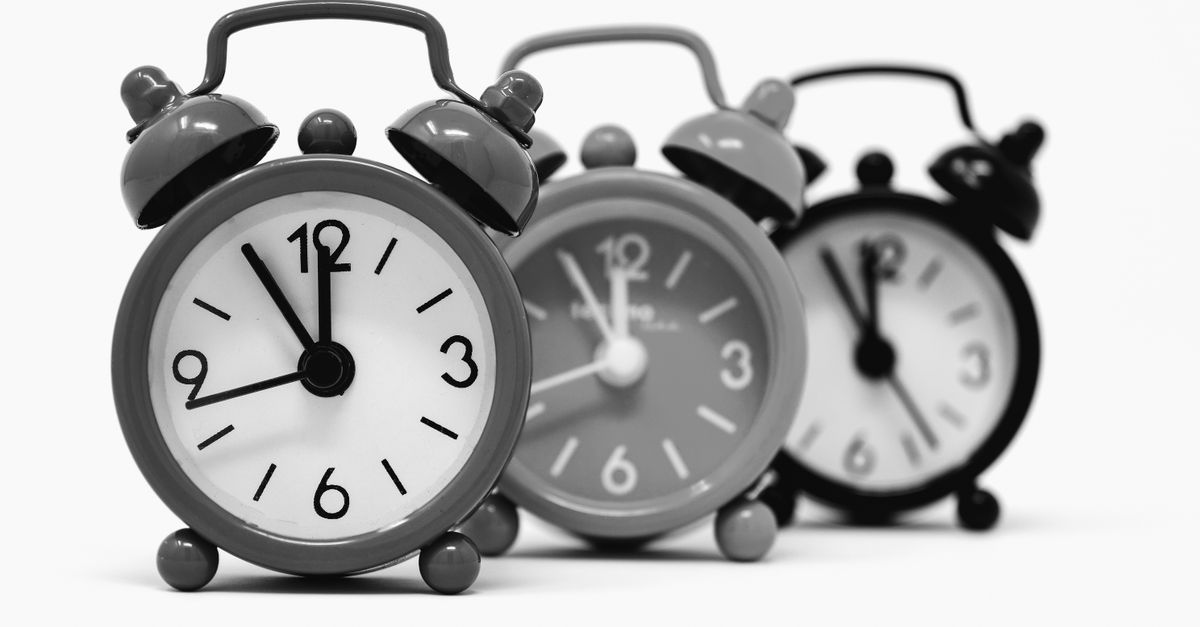 A clock face viewed close up representing real-time monitoring as the key gap in most Ahrefs alternative tools