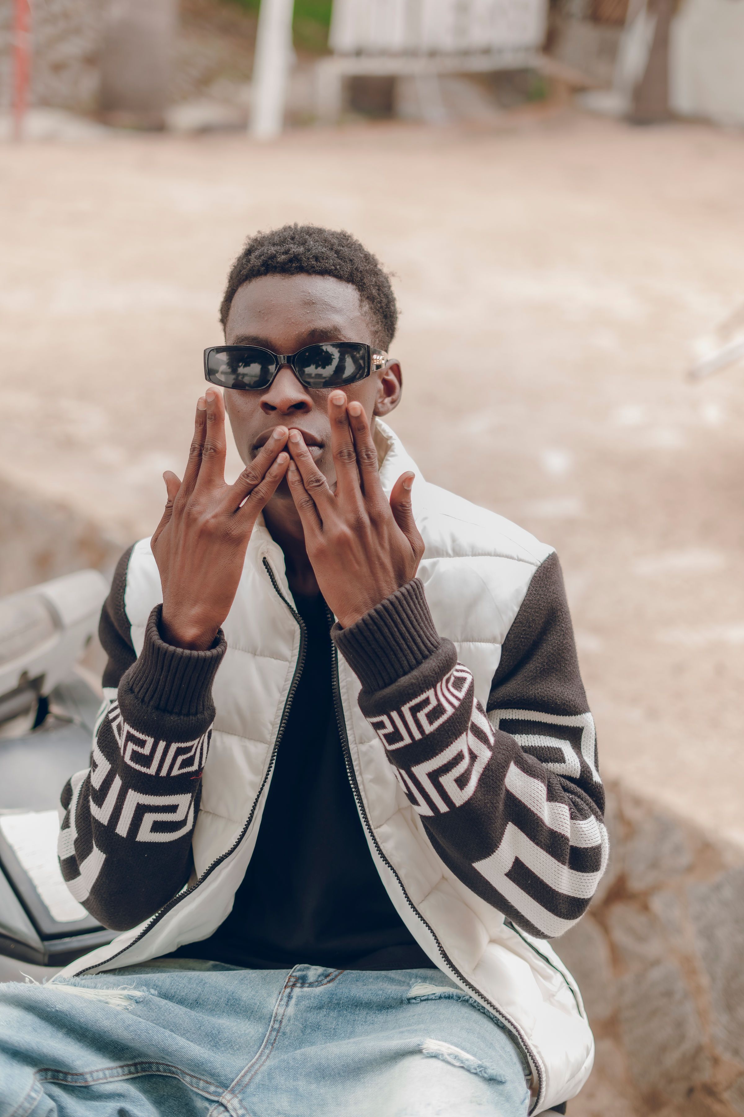Man in Red Turtleneck Sweater Holding Dslr Camera · Free Stock Photo