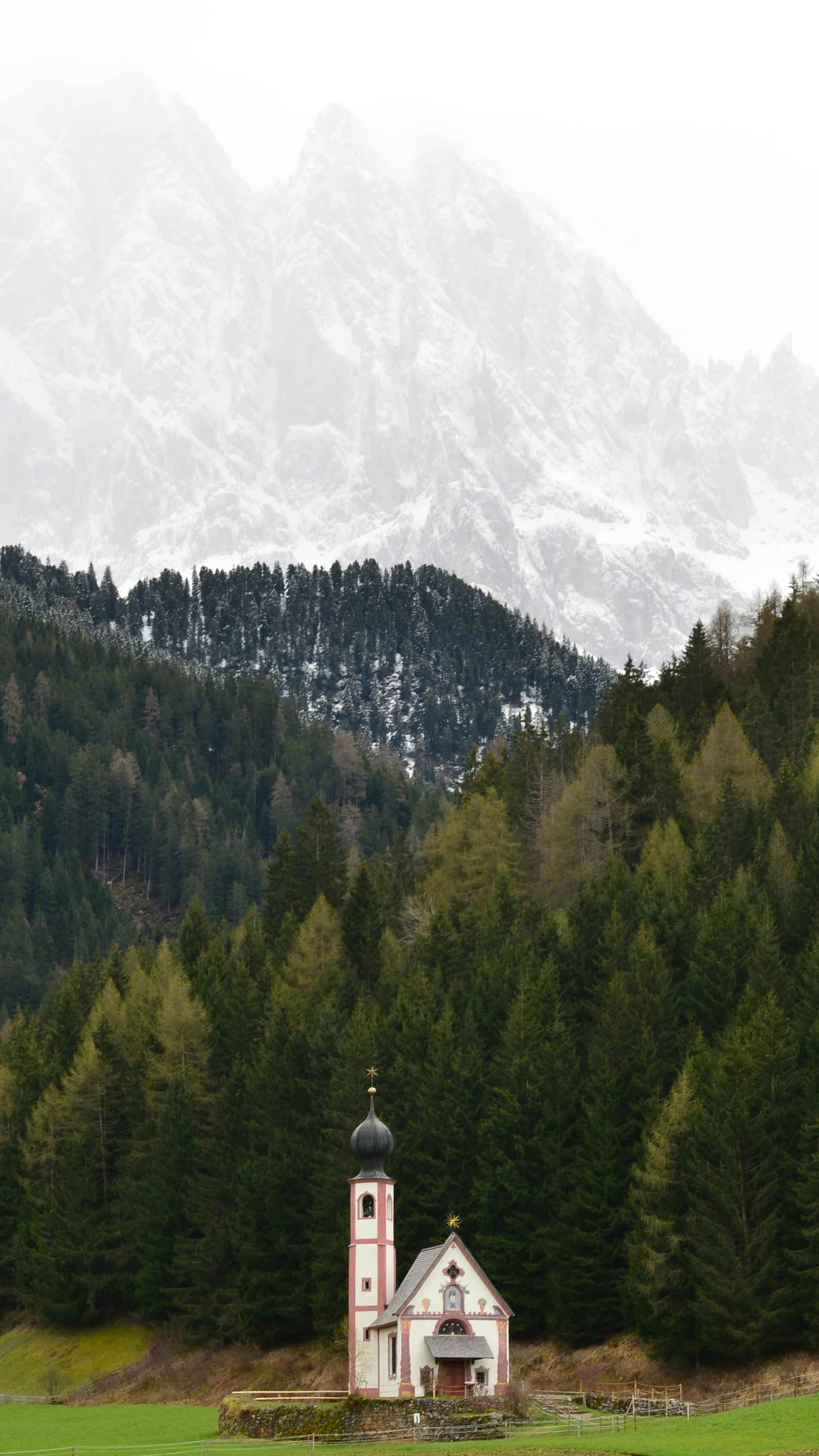 Picturesque church set against the majestic Italian Alps in St. Magdalena, Trentino-South Tyrol.