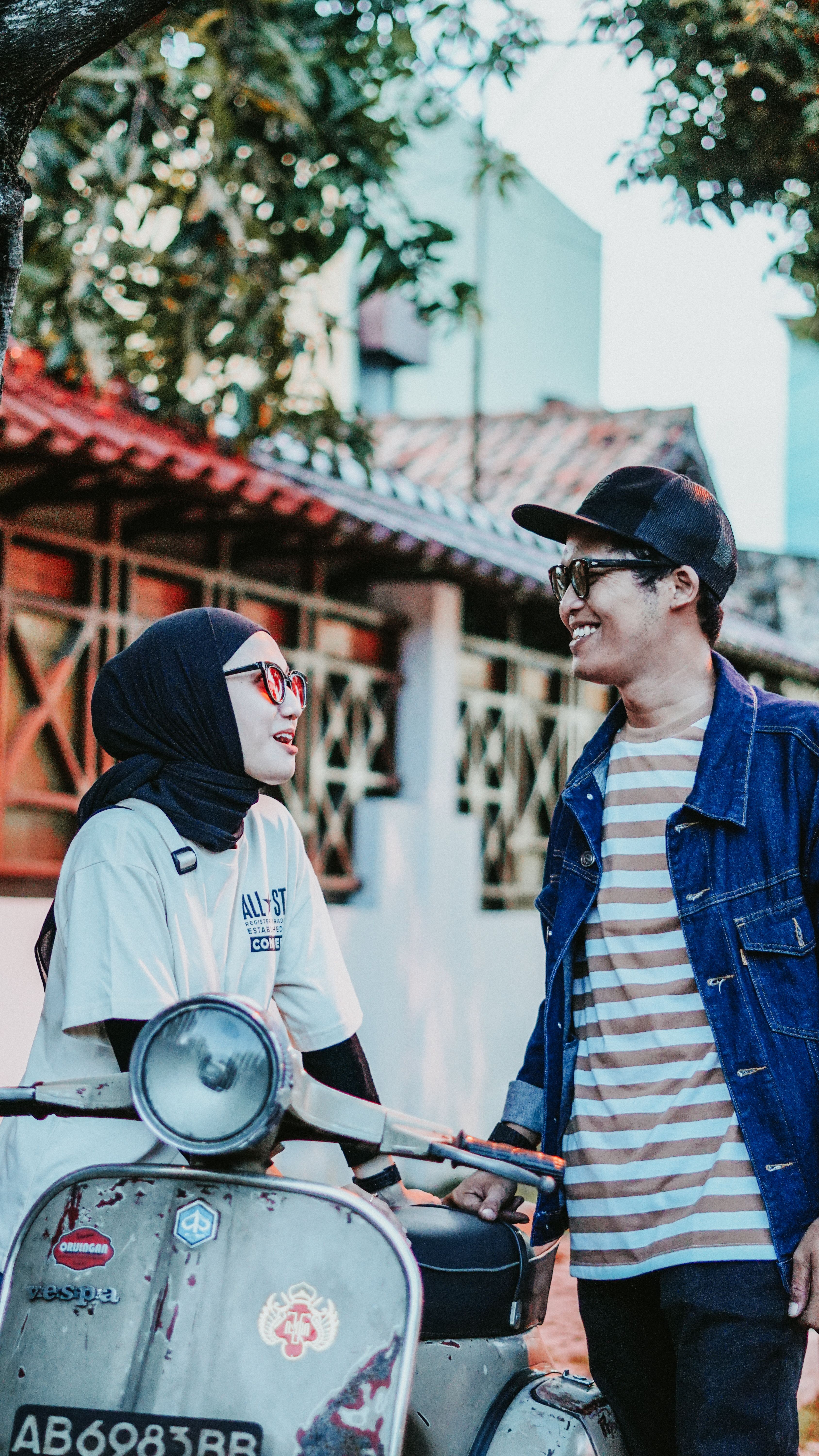 Happy Couple with Vintage Scooter in East Java