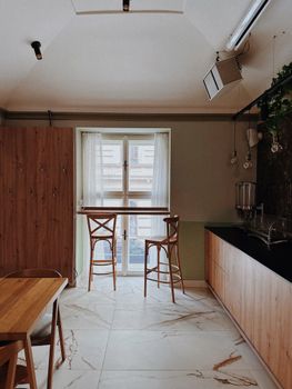Warm and inviting Scandinavian kitchen design with wooden furniture and natural light.