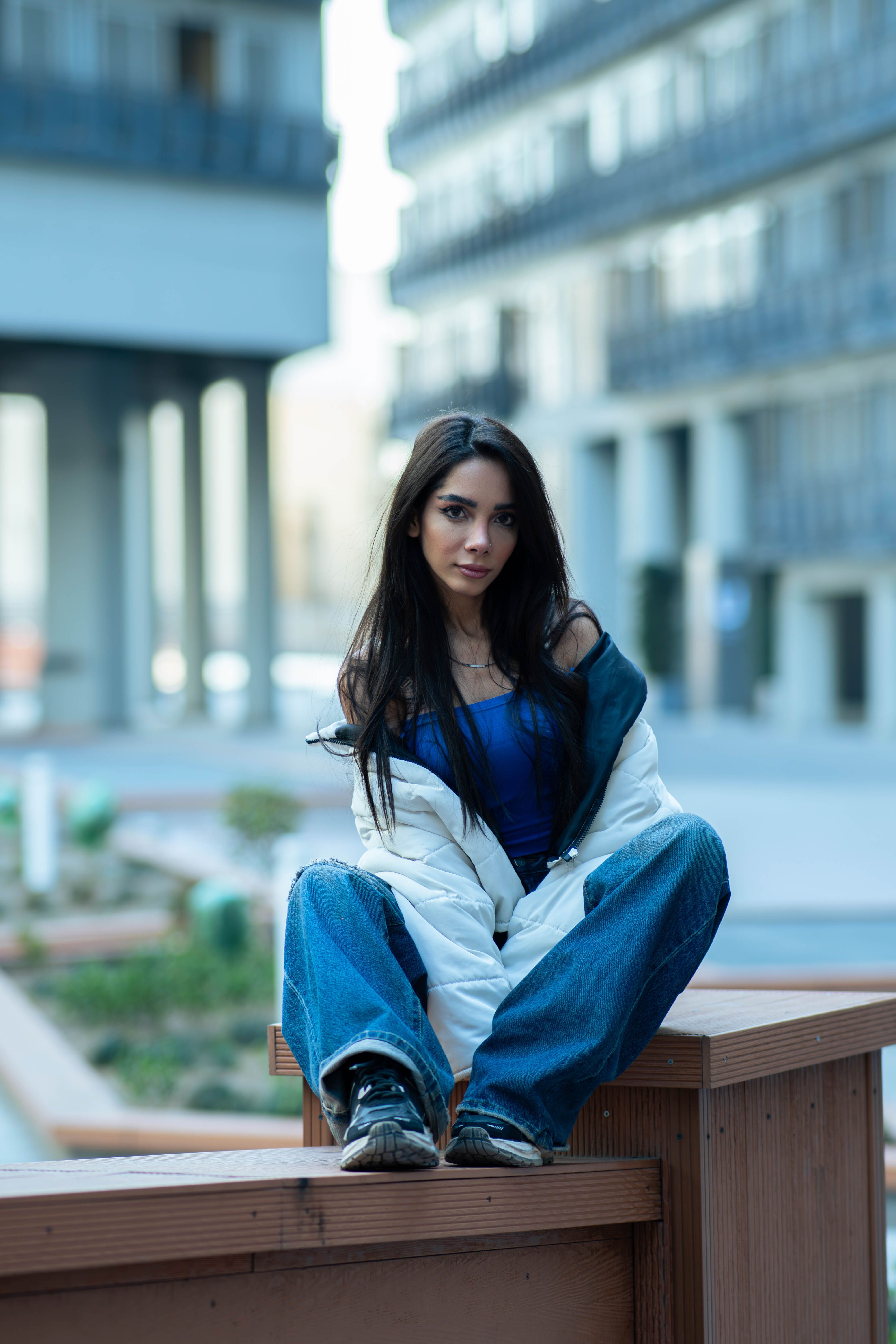 Stylish Woman Posing Outdoors in Urban Tehran · Free Stock Photo