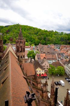 Stunning aerial view of Freiburg Cathedral and picturesque cityscape in Germany.