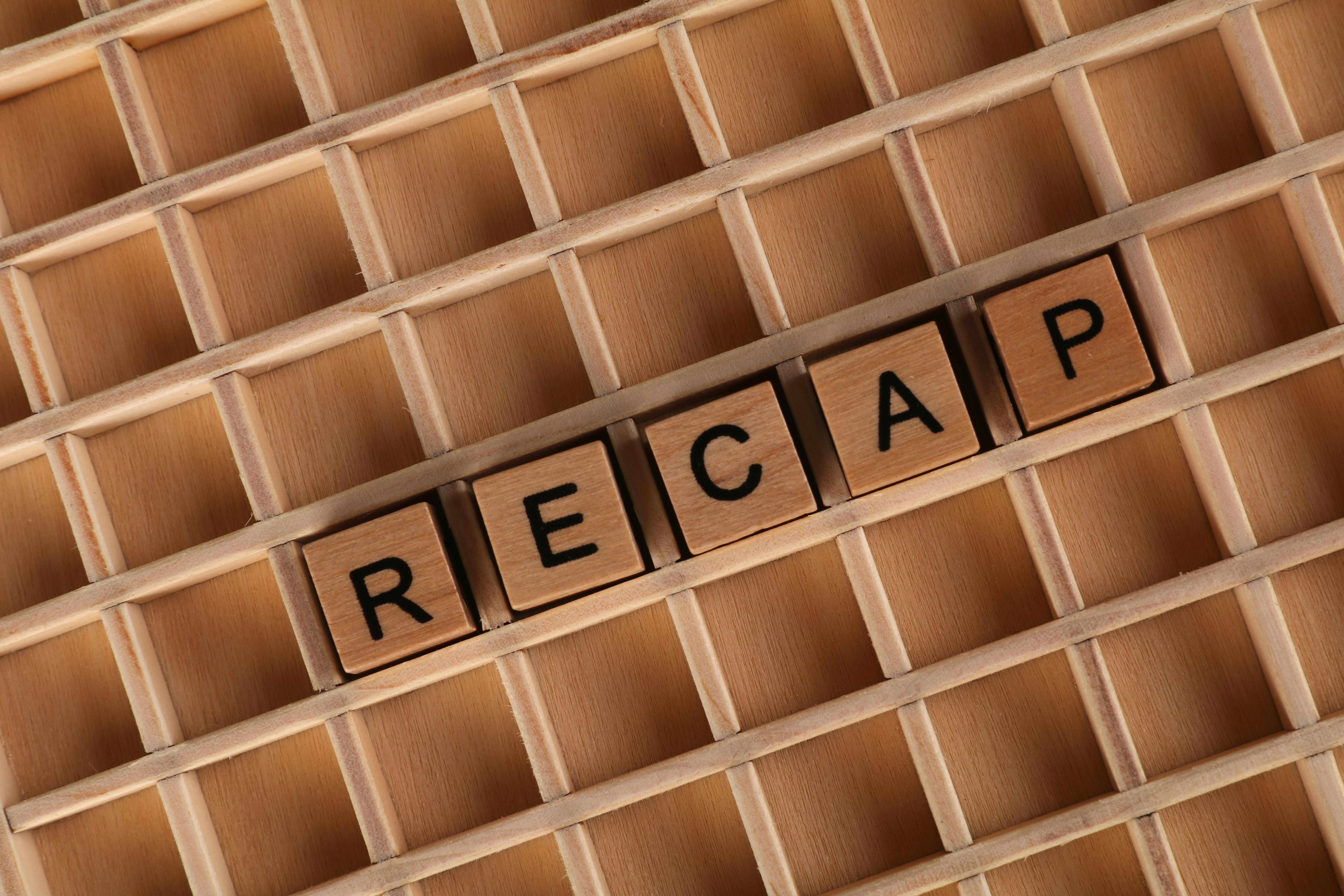 Wooden Letter Blocks Spelling 'Recap' on a Grid · Free Stock Photo