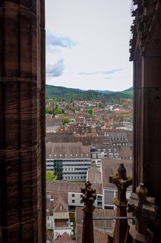 Charming European cityscape view from above, highlighting historic architecture.