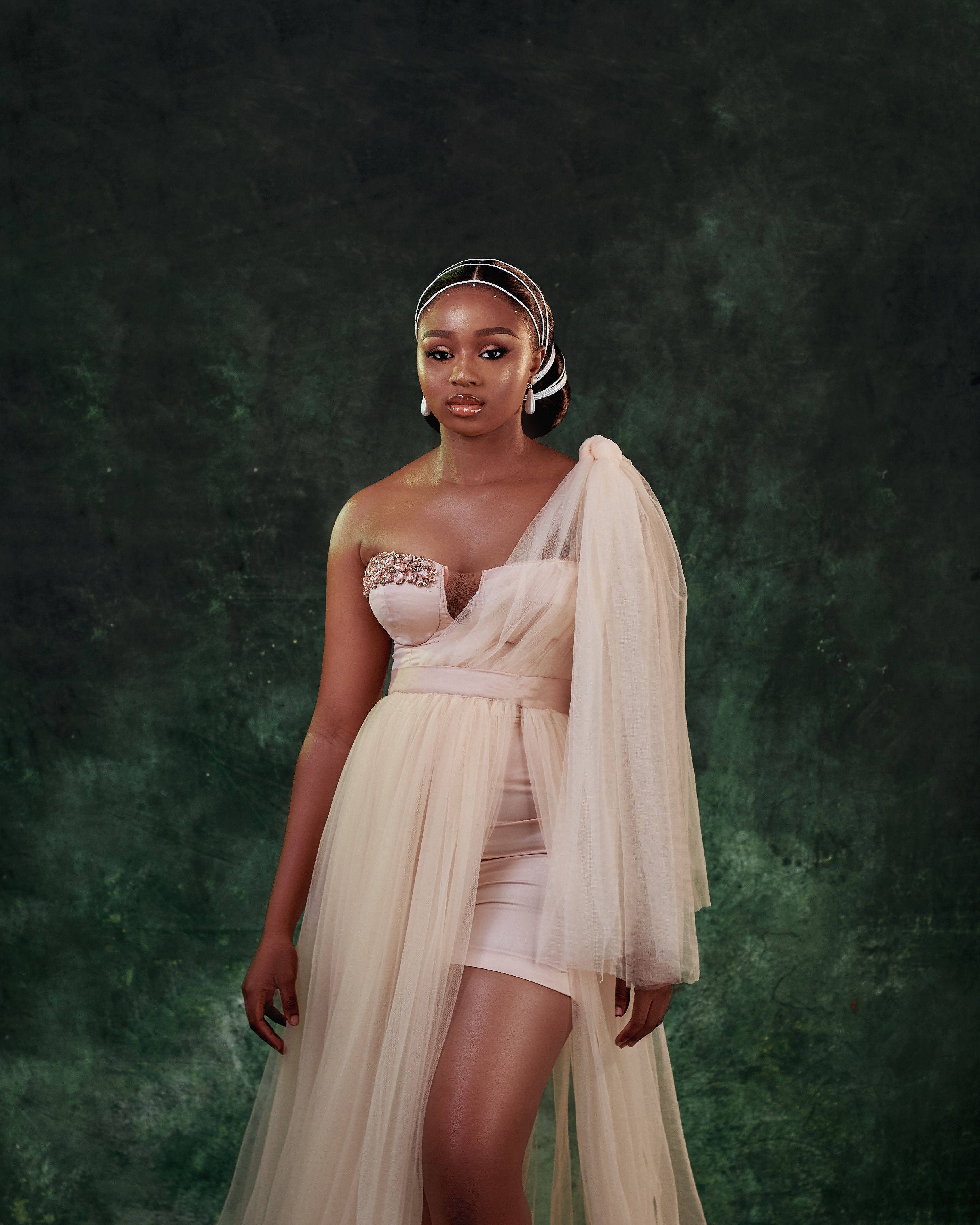 Elegant Portrait of Woman in Stylish Gown