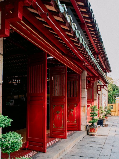 Free Charming red traditional building in Hồ Chí Minh, showcasing Vietnamese architecture. Stock Photo