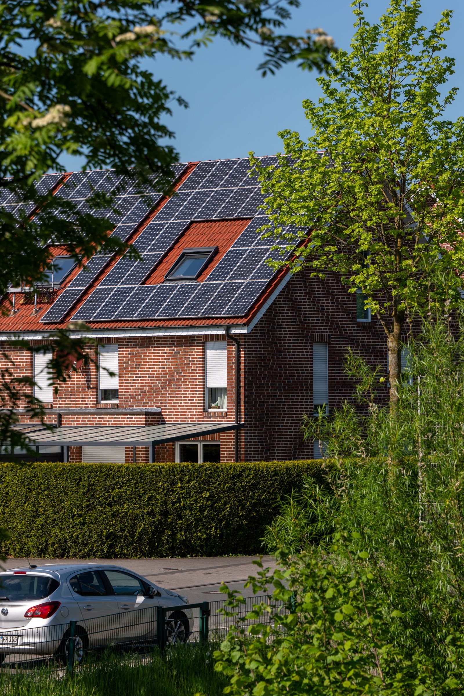 Modern residential home with rooftop solar panels