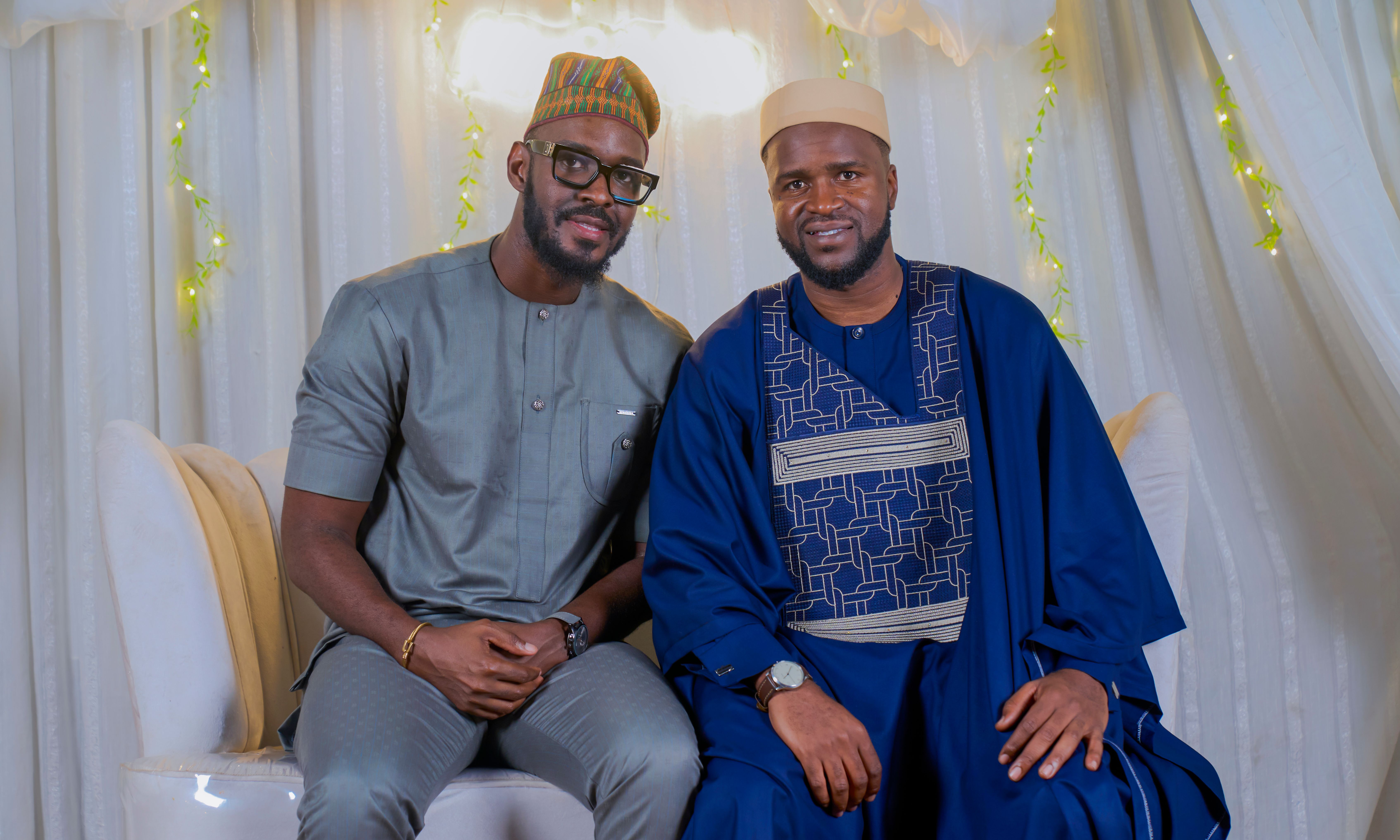 Two men in traditional African attire posing indoors · Free Stock Photo