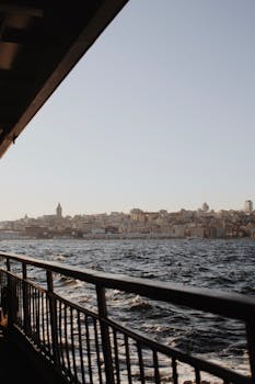 Enjoy an iconic view of Istanbul's skyline from a ferry on the Bosphorus at sunset.