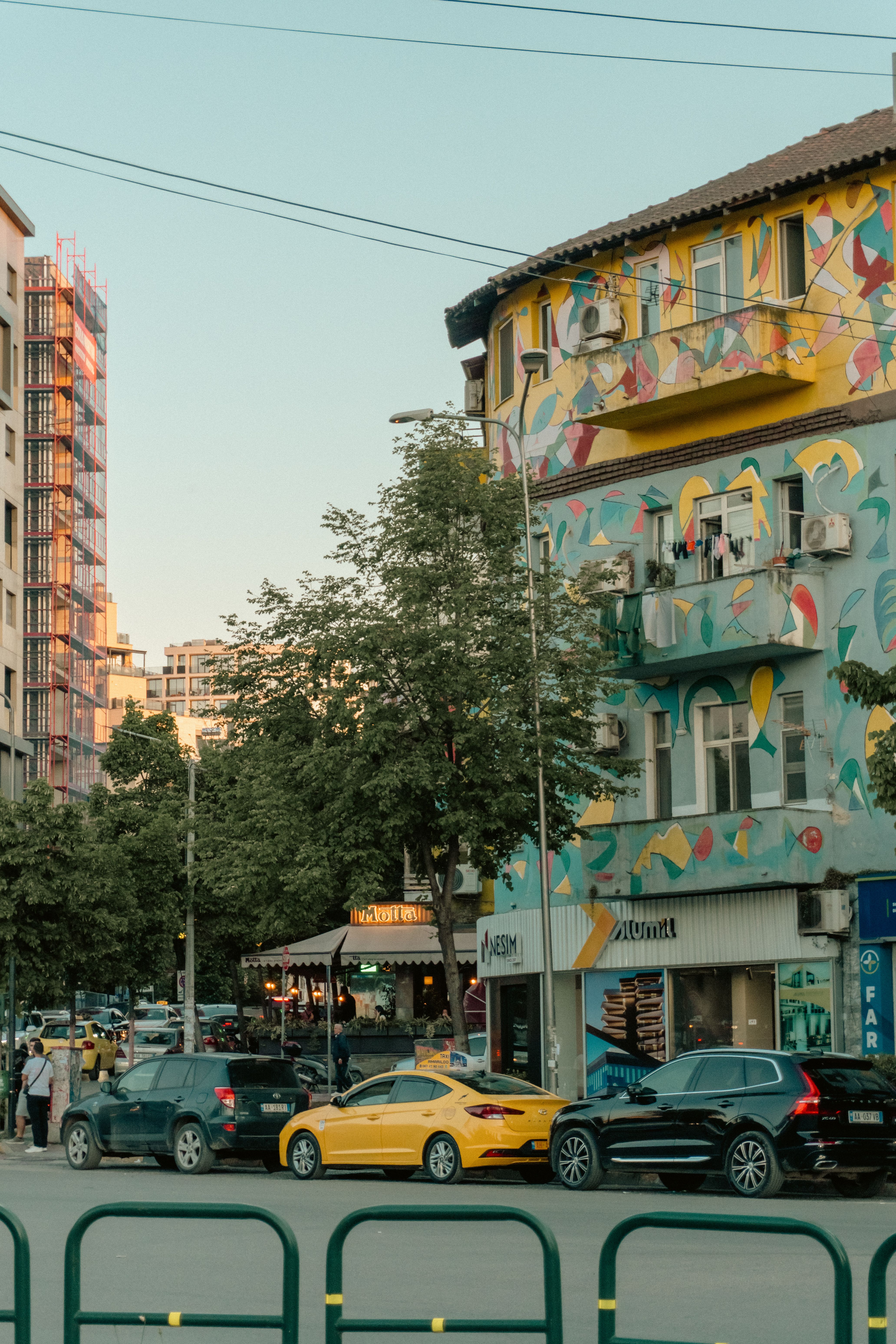 Colorful Urban Street Scene with Mural · Free Stock Photo