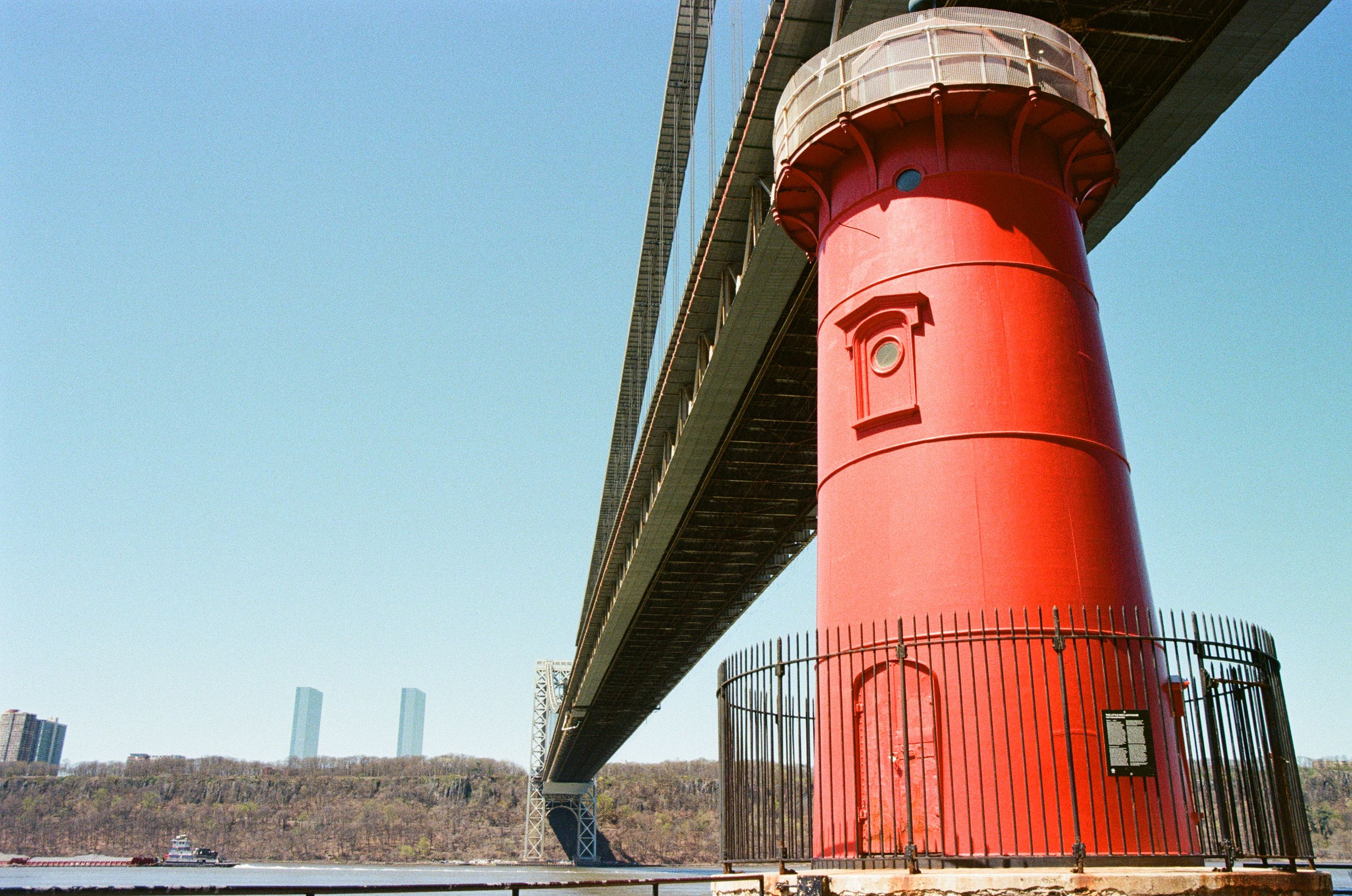 Red Lighthouse under George Washington Bridge · Free Stock Photo