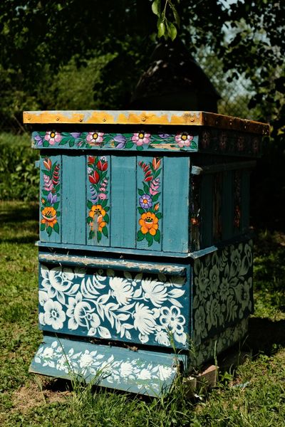 Painted beehive-panel art