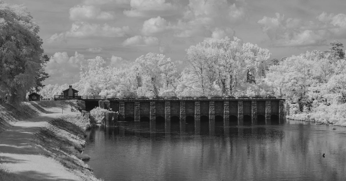 Black and white infrared photo of a historic bridge near Broad River, Columbia, South Carolina.