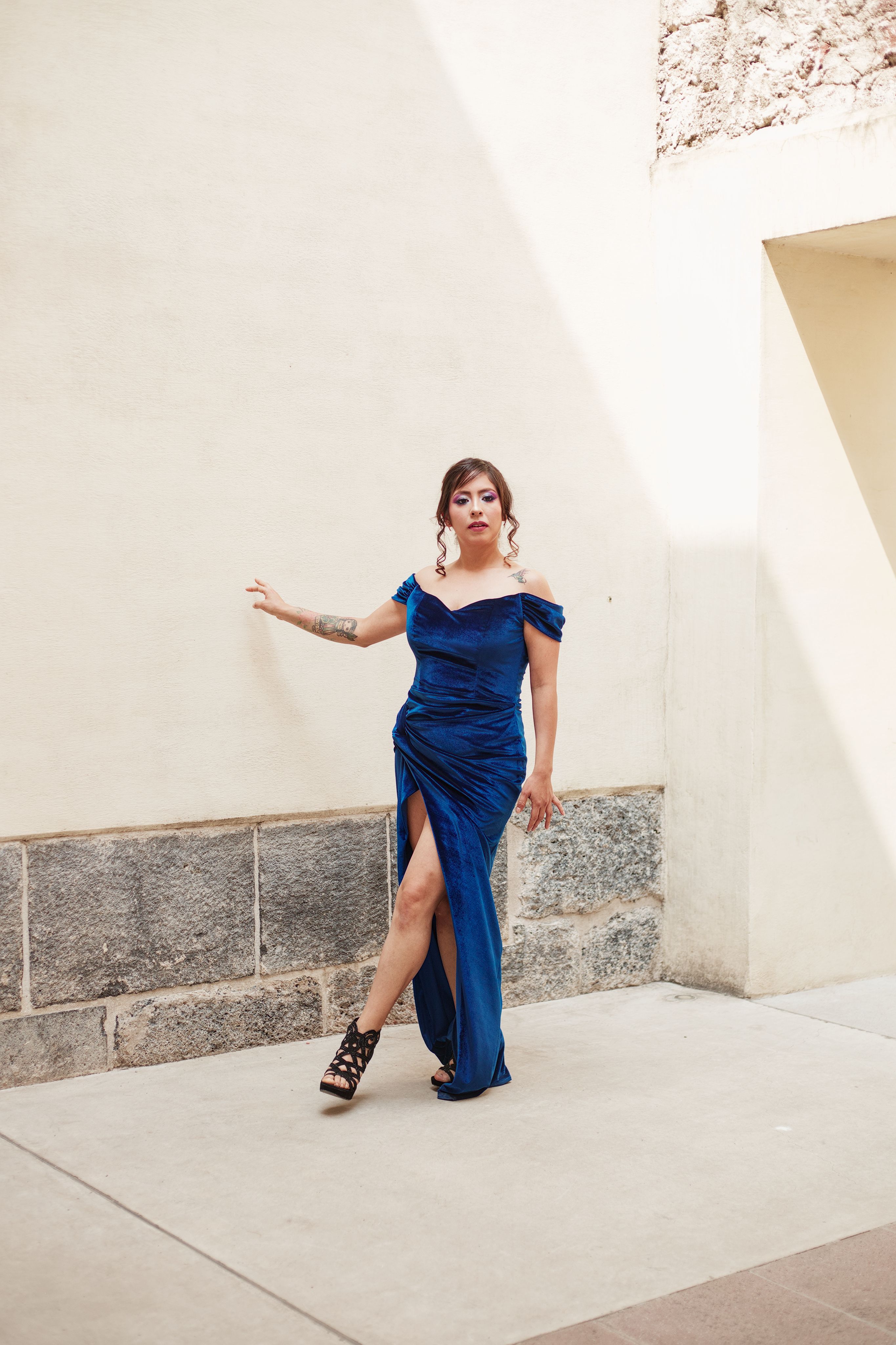 Elegant Woman in Blue Dress Posed Outdoors · Free Stock Photo