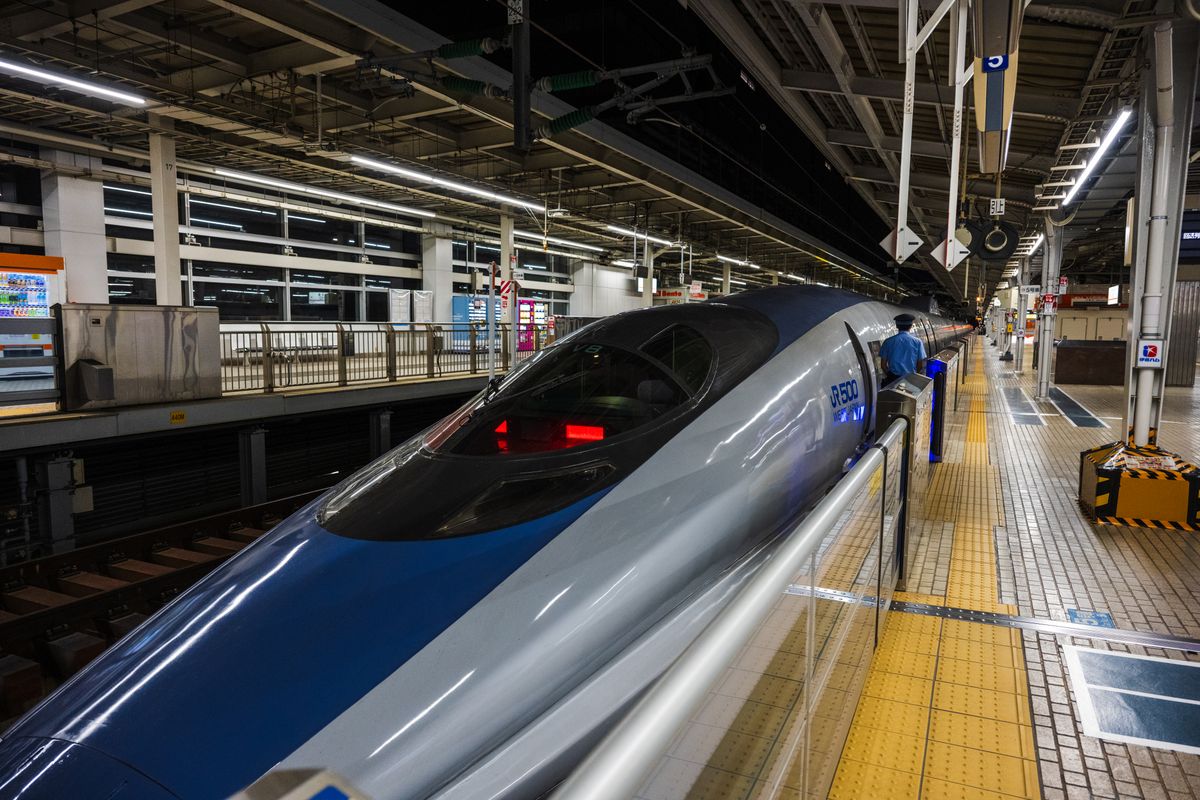 Japan Rail shinkansen bullet train at station platform