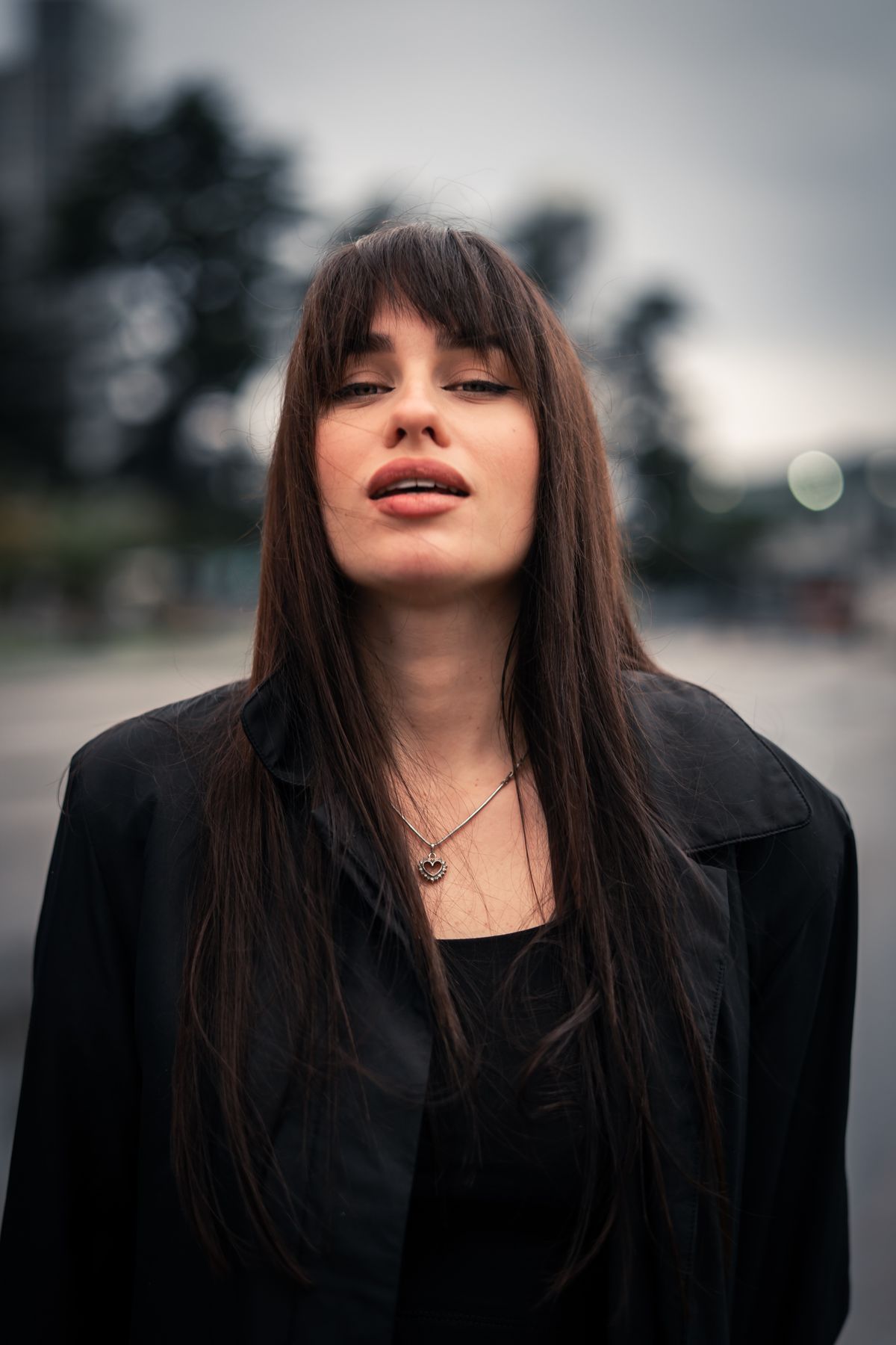 Portrait of a Woman in Tehran Street Setting · Free Stock Photo
