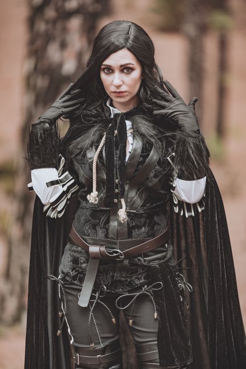 Free A woman in fantasy costume posing in a lush forest setting on Canary Islands. Stock Photo
