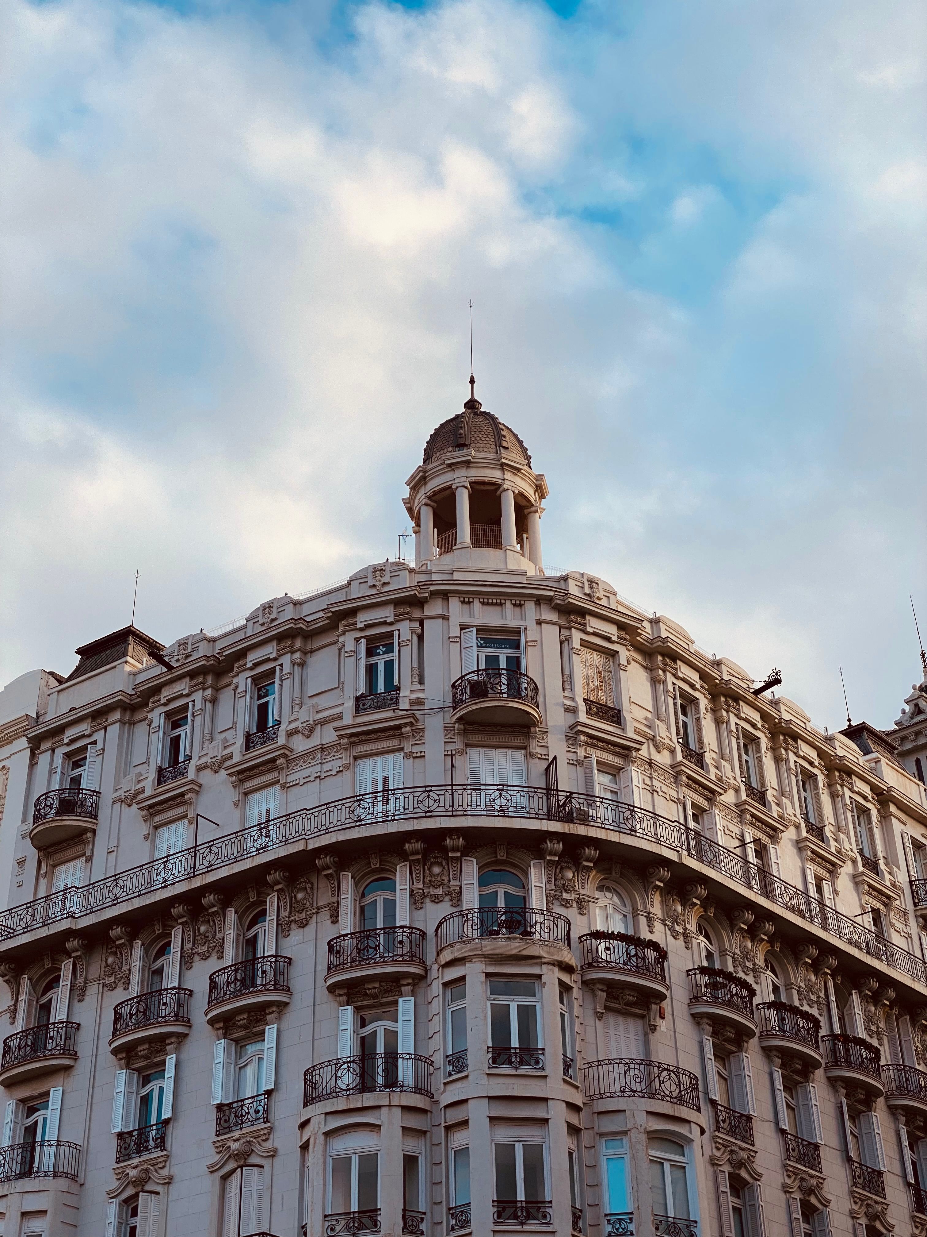 Elegant Historic Building Under Blue Sky · Free Stock Photo
