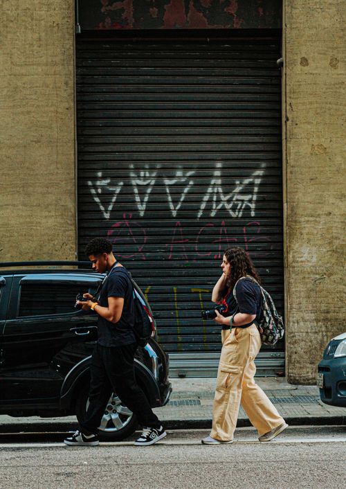 Free Candid street photography capturing daily life in downtown São Paulo, Brazil. Stock Photo